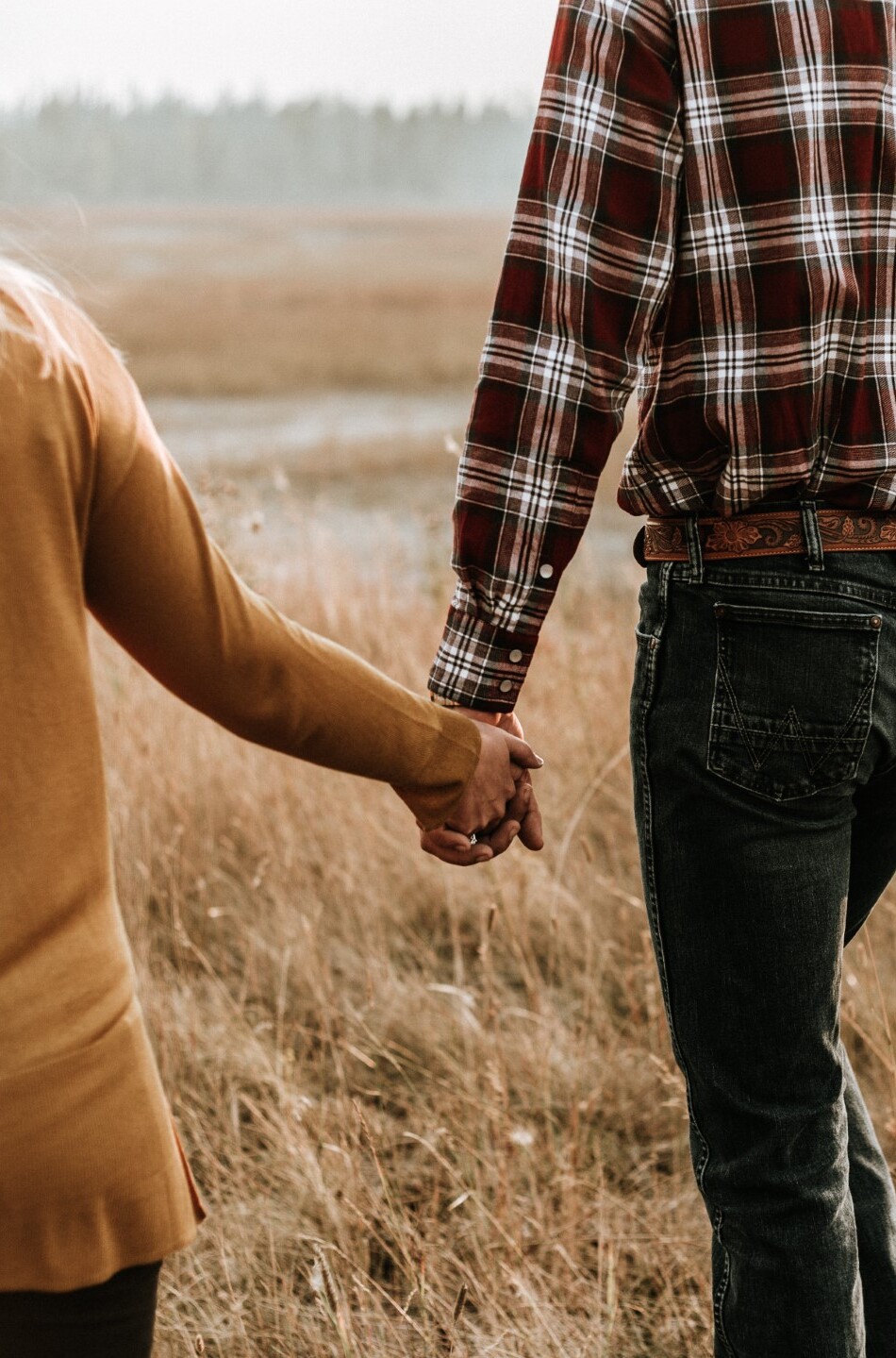 holding hands in nature