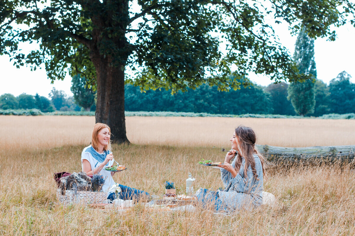 two girls having a picnic